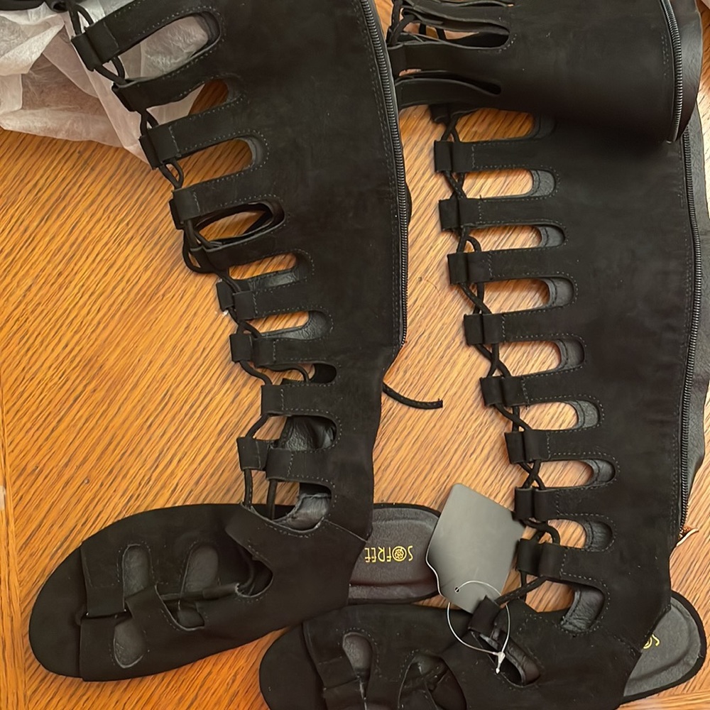 Brand new with box and dust bags. SOFREE knee high sandals. Never worn.
